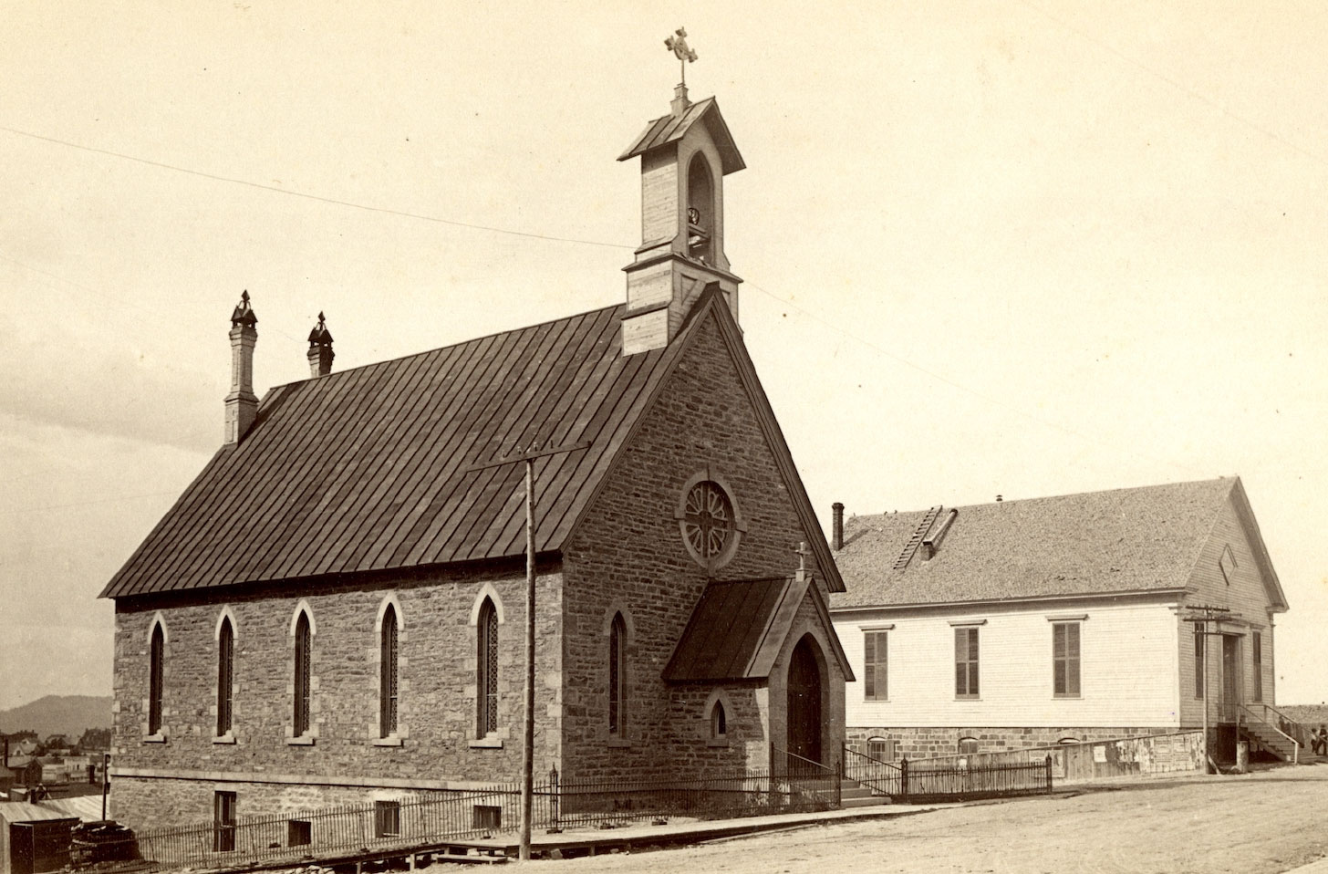 Historic photograph of the early St. Peter’s Episcopal Cathedral congregation in Helena, Montana